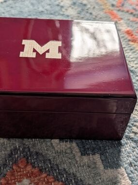 Glossy Maroon Wood Jewelry Box with White 'M' Accent